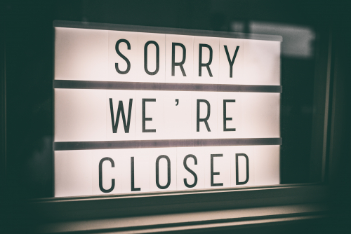 sorry we're closed window sign